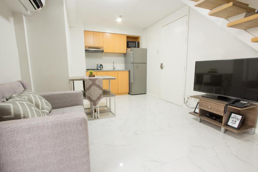 Апартаменты (Апартаменты с 2 спальнями), Oasis Regency @ Fort Victoria BGC