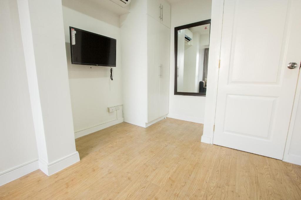 Апартаменты (Апартаменты с 2 спальнями), Oasis Regency @ Fort Victoria BGC