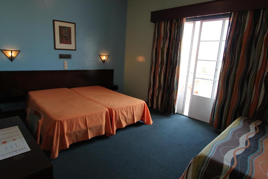 Двухместный (Двухместный номер с 2 отдельными кроватями и дополнительной кроватью (для 2 взрослых и 1 ребенка в возрасте до 12 лет)), Residencial Horizonte