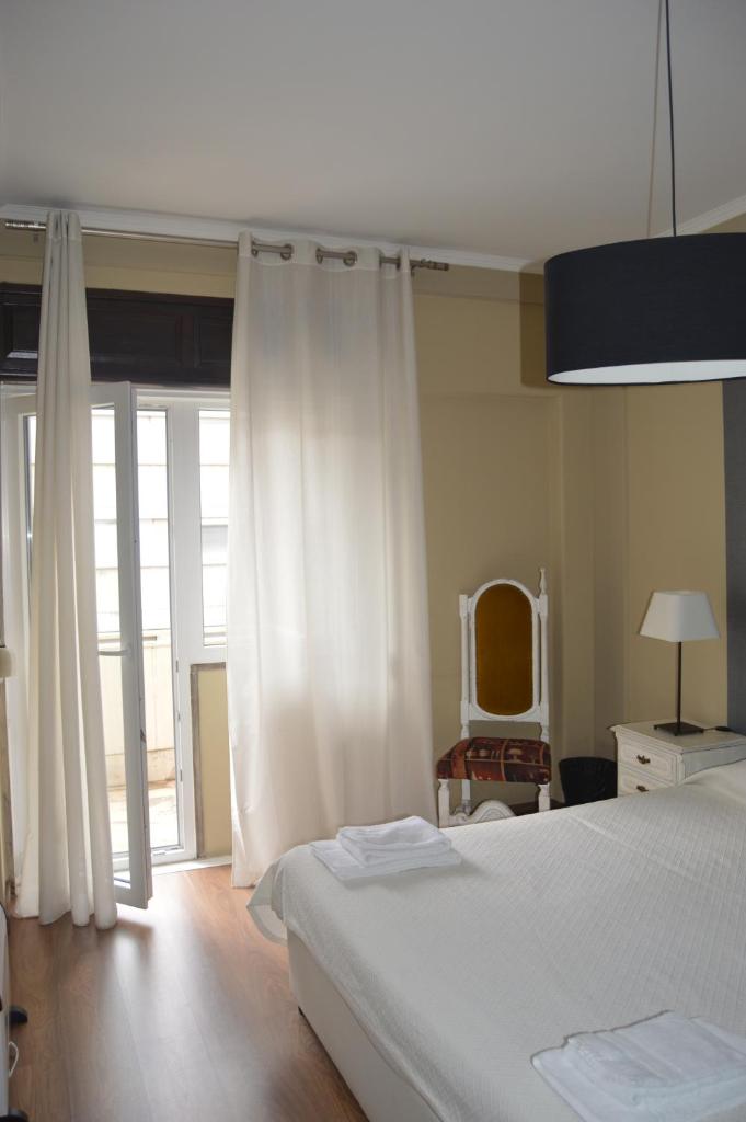 Двухместный (Стандартный двухместный номер с 1 кроватью или 2 отдельными кроватями, балконом и общей ванной комнатой), Wallis Rato