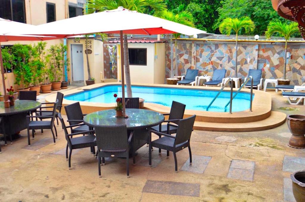 Phratamnak Inn, Паттайя