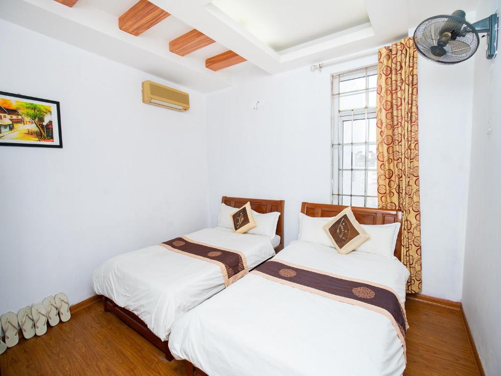 Двухместный (Двухместный номер Делюкс с 2 отдельными кроватями), Phuong Dong hotel