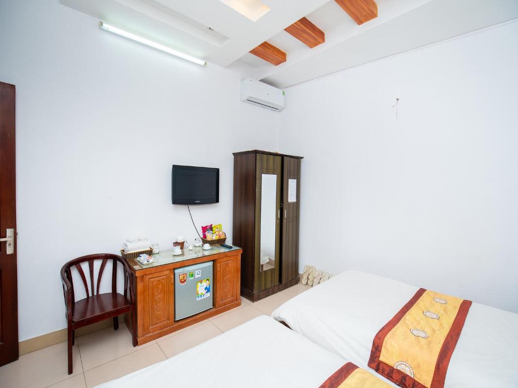 Двухместный (Двухместный номер Делюкс с 2 отдельными кроватями), Phuong Dong hotel