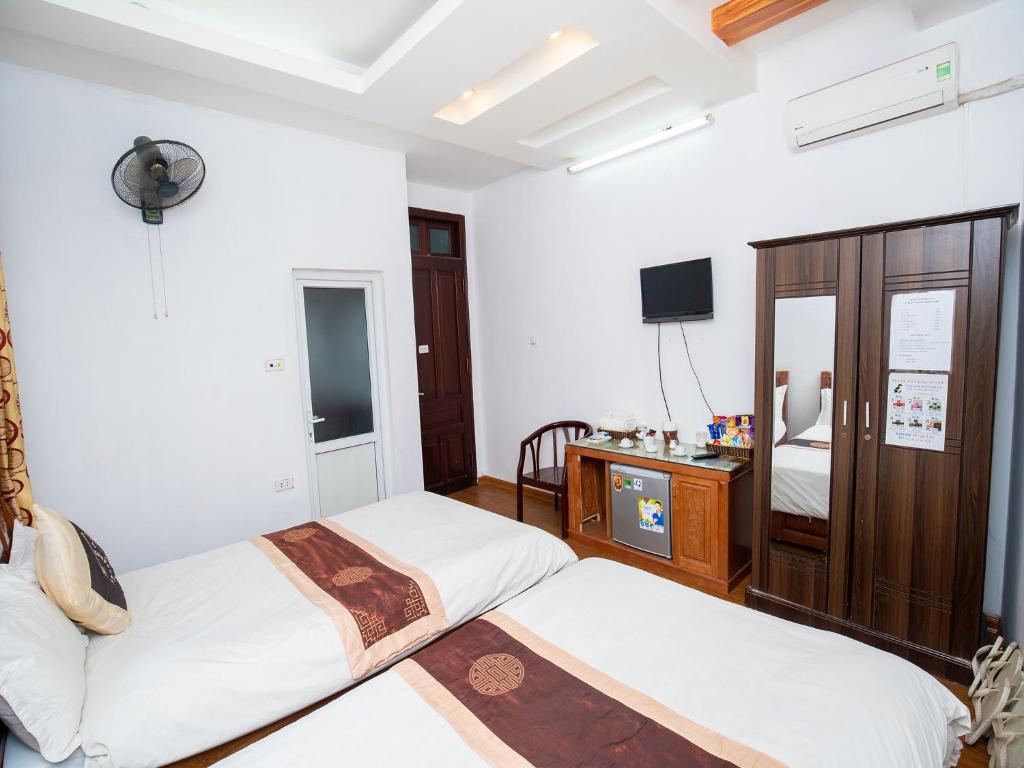 Двухместный (Двухместный номер Делюкс с 2 отдельными кроватями), Phuong Dong hotel