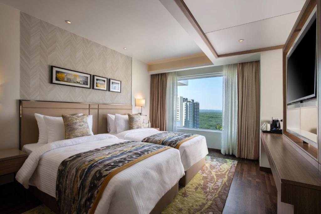 Двухместный (Двухместный люкс с 2 отдельными кроватями), Royal Hometel Suites