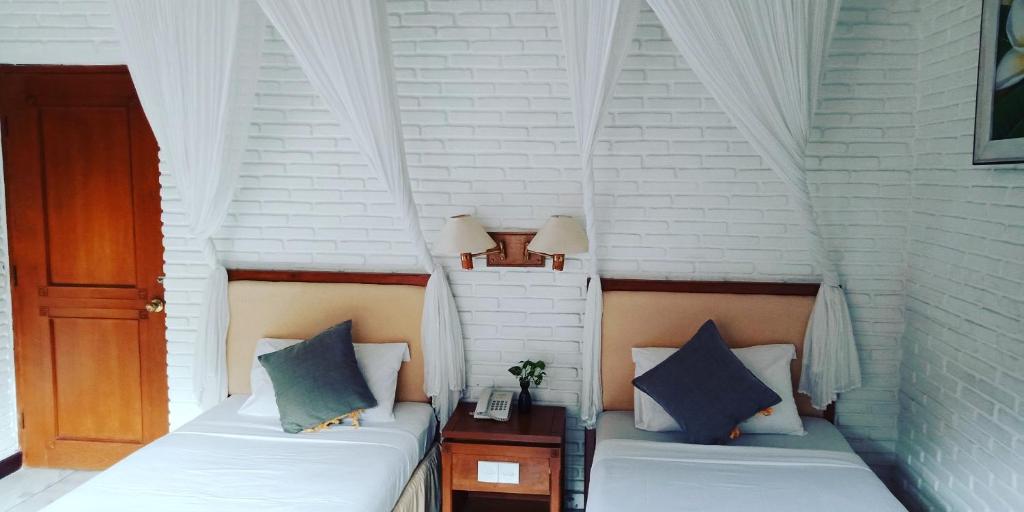 Двухместный (Улучшенный двухместный номер с 1 кроватью или 2 отдельными кроватями и видом на сад), Puri Padi