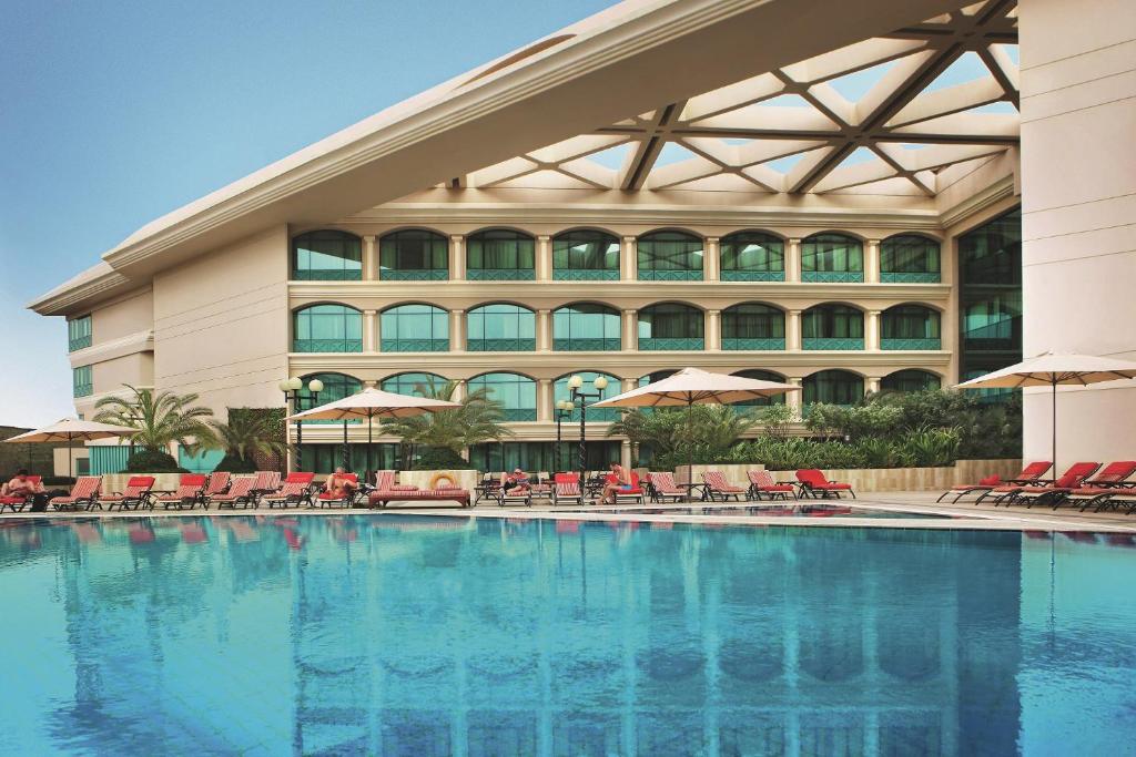 Отель Roda Al Bustan Hotel, Дубай