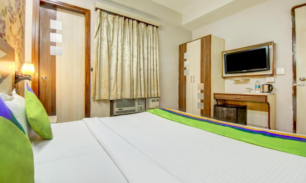 Двухместный ([Sanitized] Standard Double Room), Treebo Rockwell Plaza