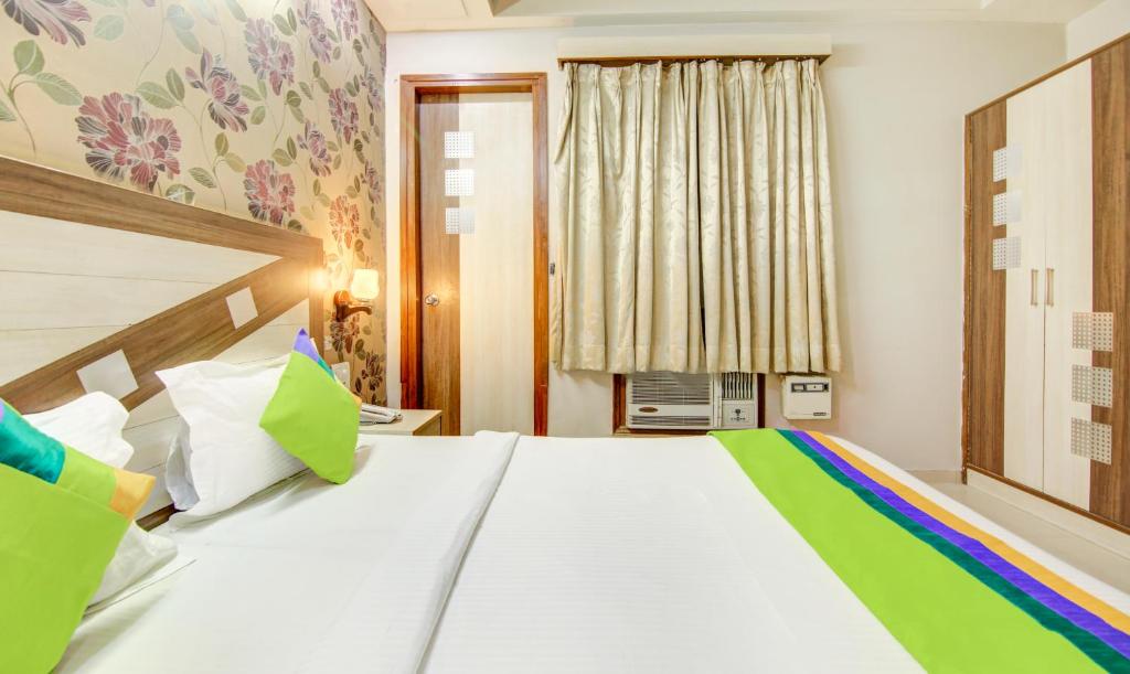 Двухместный ([Sanitized] Standard Double Room), Treebo Rockwell Plaza