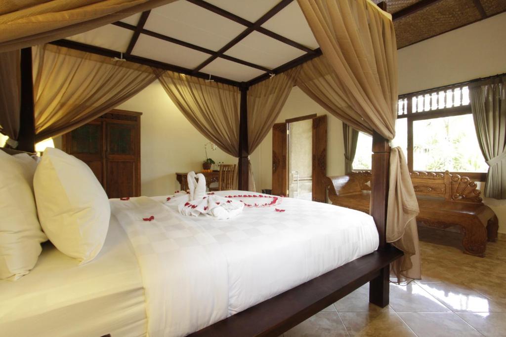 Двухместный (Улучшенный двухместный номер с 1 кроватью или 2 отдельными кроватями и видом на сад), Pekak Mangku Guest House