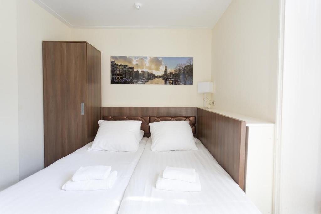 Двухместный (Небольшой двухместный номер с 2 отдельными кроватями) отеля Hotel Park Plantage, Амстердам