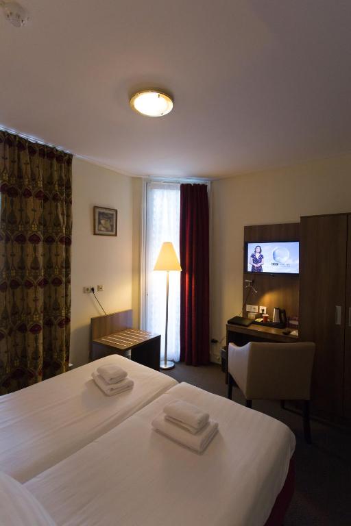 Двухместный (Стандартный двухместный номер с 2 отдельными кроватями и душем) отеля Hotel Park Plantage, Амстердам