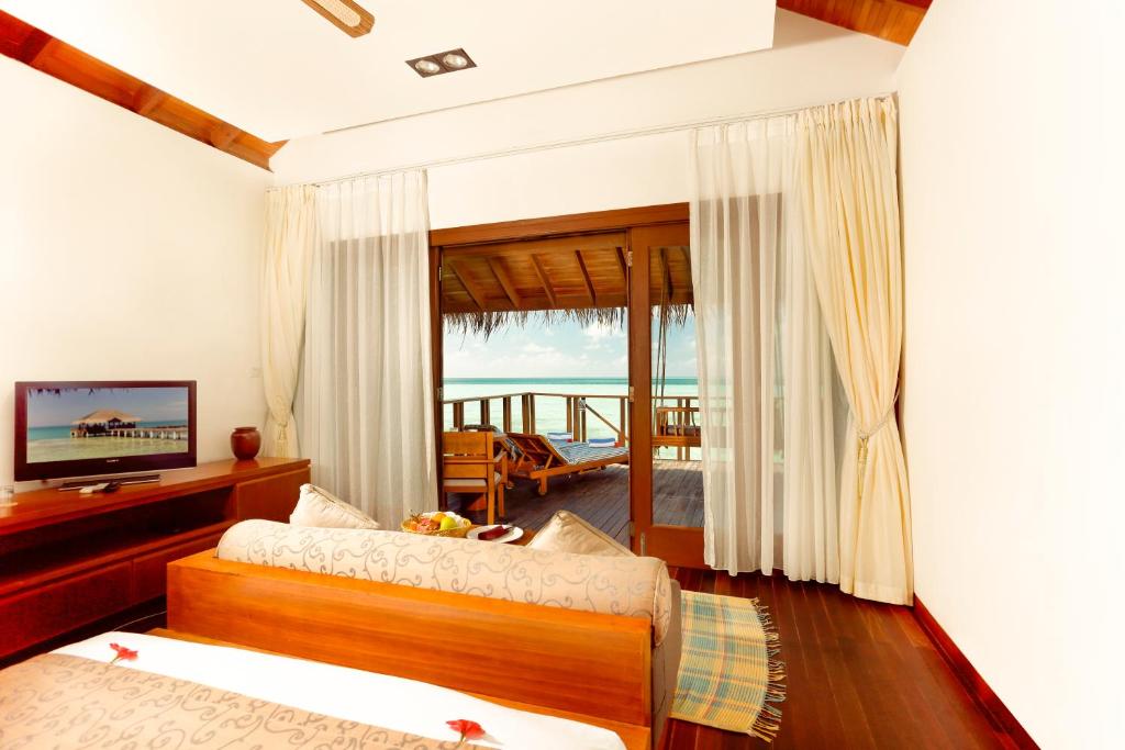 Вилла (Вилла на воде) курортного отеля Medhufushi Island Resort, Мафури