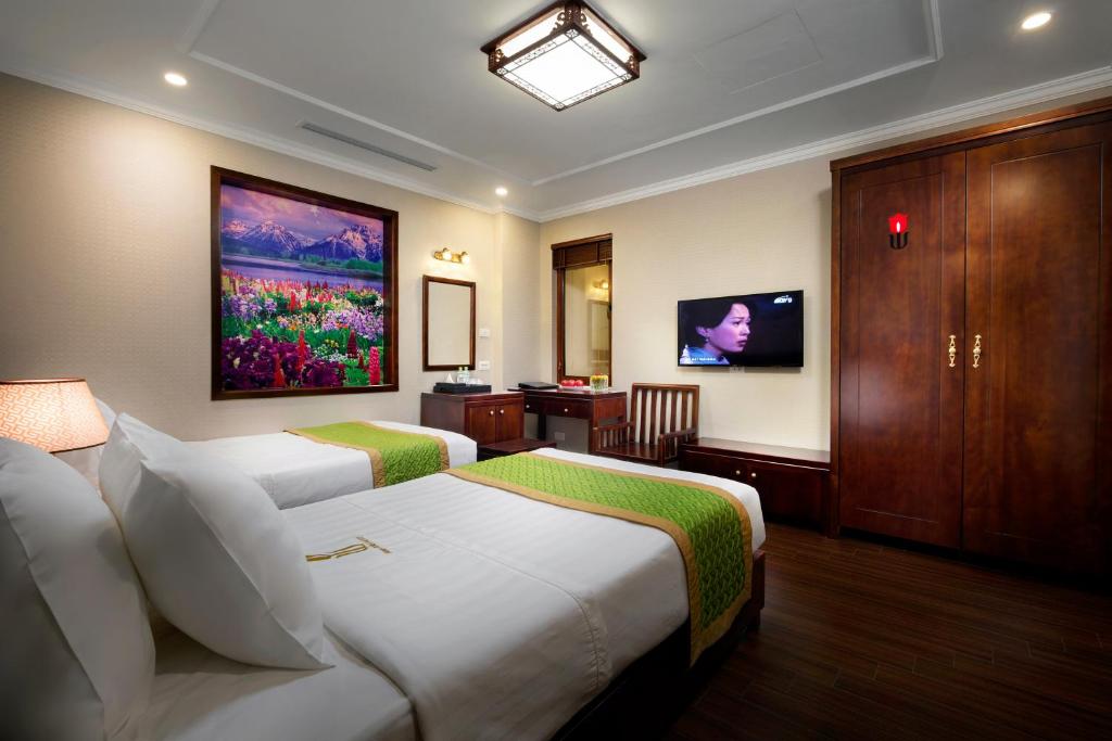 Двухместный (Улучшенный двухместный номер с 2 отдельными кроватями) отеля Binh Anh Hotel Hanoi, Ханой
