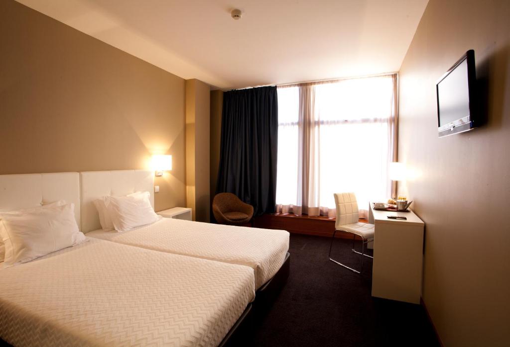 Двухместный (Стандартный двухместный номер с 1 кроватью или 2 отдельными кроватями) отеля Porto Antas Hotel, Порту
