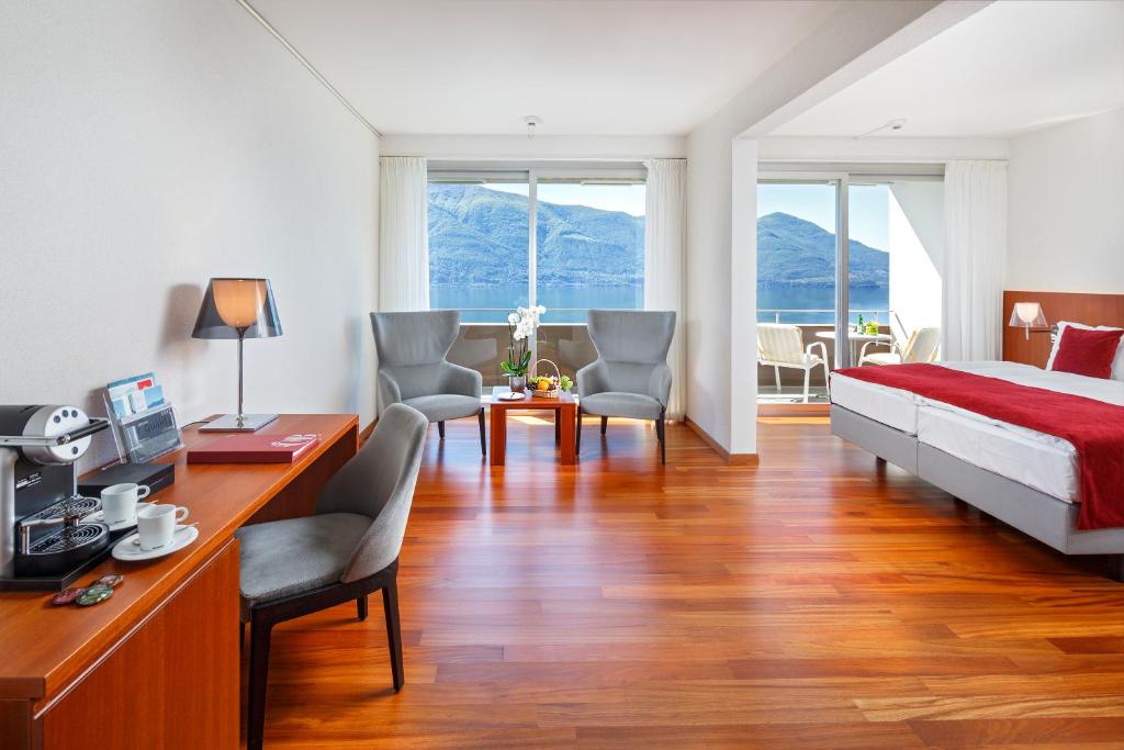 Сьюит (Panorama Junior Suite with air condition) отеля Casa Berno Swiss Quality Hotel, Аскона