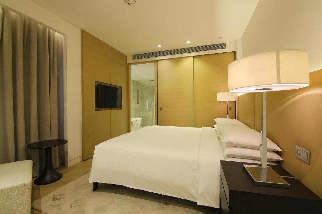 Апартаменты (Апартаменты с 3 спальнями, кухней и гостиной) отеля Hyatt Regency Delhi, Нью-Дели