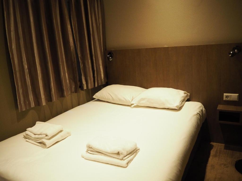 Двухместный (Небольшой двухместный номер с 1 кроватью, без вида) отеля Aston City Hotel, Амстердам