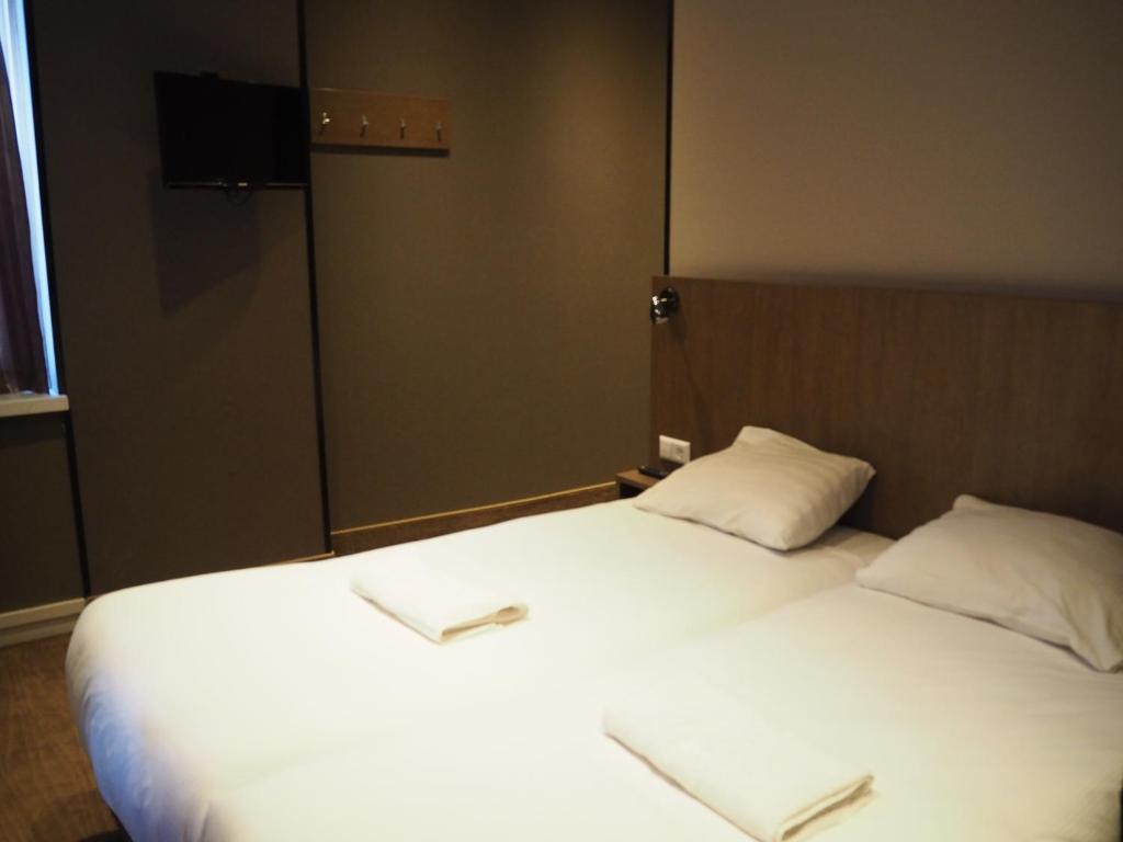 Двухместный (Стандартный двухместный номер с 2 отдельными кроватями) отеля Aston City Hotel, Амстердам