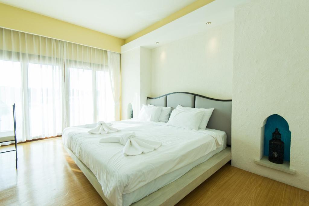 Двухместный (Двухместный номер Делюкс с 2 отдельными кроватями) отеля Baan Talay See Cream Resort, Самутсонгкхрам