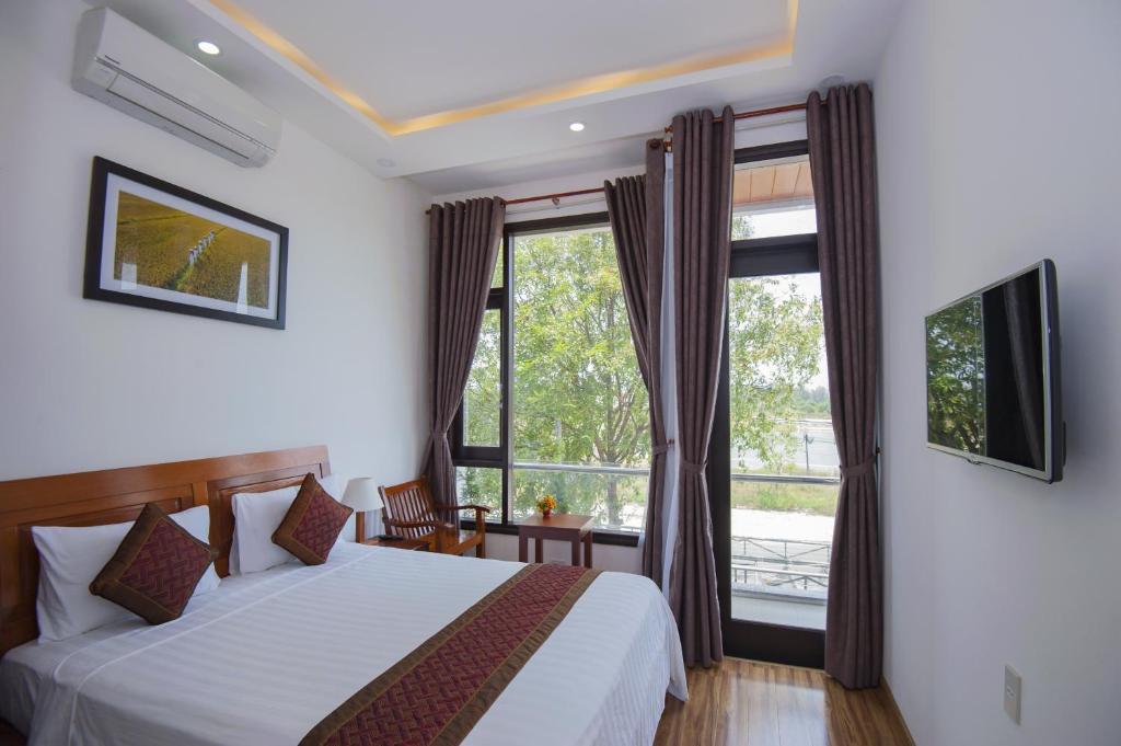 Двухместный (Deluxe Double Room with Garden view or Balcony) виллы Hoi An Sun Lake Homestay, Хойан