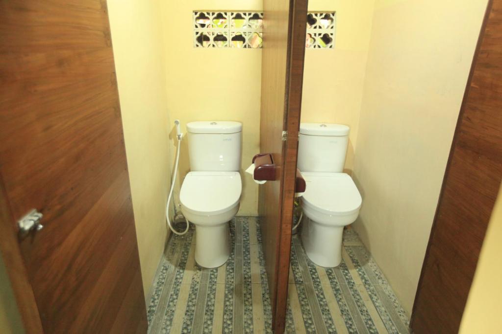 Номер (Кровать в общем 6-местном номере для мужчин и женщин), Liang House and Hostel