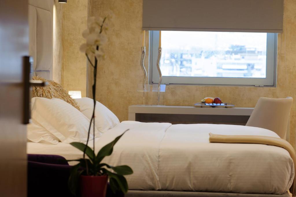 Двухместный (Стандартный двухместный номер с 1 кроватью или 2 отдельными кроватями) отеля Athenaeum Grand Hotel, Афины