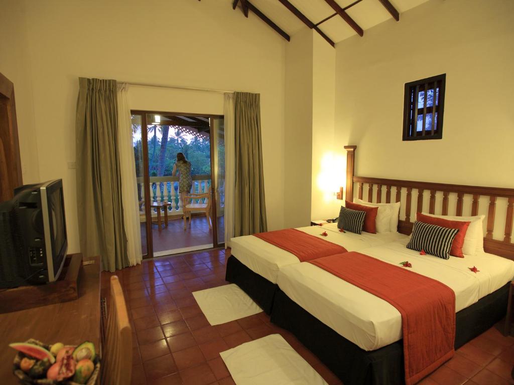 Двухместный (Улучшенный номер с балконом - Занятия йогой и аюрведические процедуры) курортного отеля Siddhalepa Ayurveda Health Resort, Ваддува