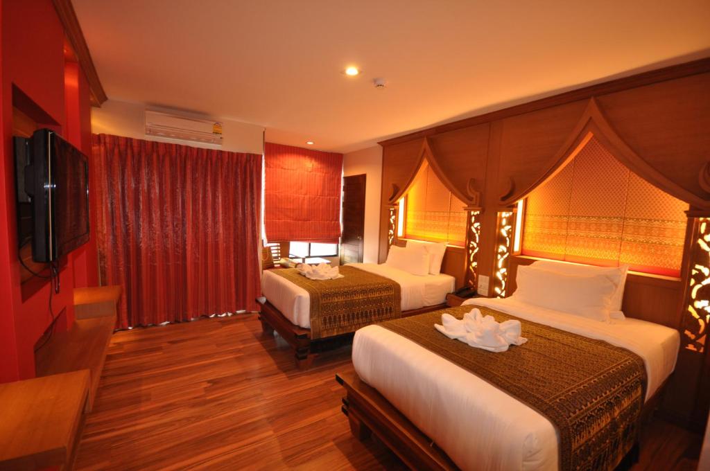 Двухместный (Улучшенный двухместный номер с 2 отдельными кроватями) отеля Chalelarn Hotel Hua Hin, Хуахин