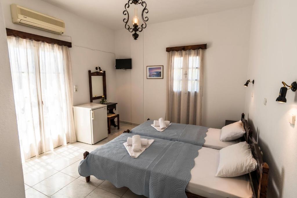 Двухместный (Бюджетный двухместный номер с 2 отдельными кроватями) отеля Villa Kalamia Dolphins, Перисса