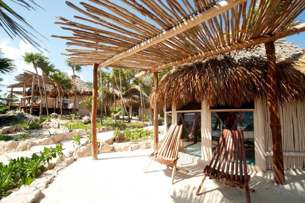 Номер (Коттедж с видом на океан - 2 кровати) отеля Papaya Playa Project, Тулум