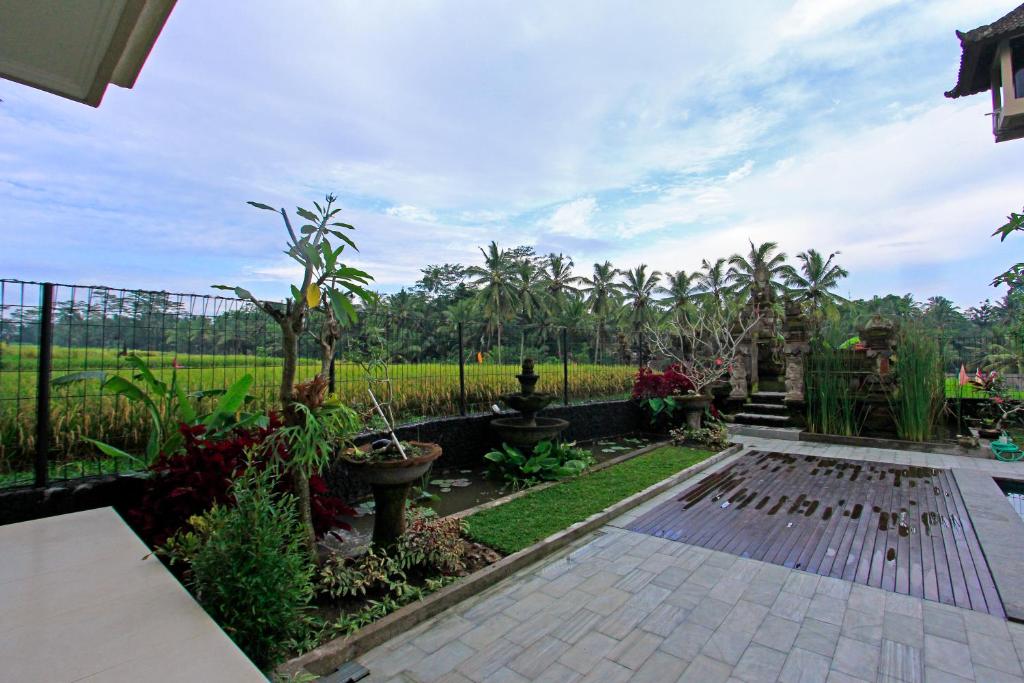 Сьюит (Суперлюкс с видом на бассейн) гостевого дома Inang Villa, Убуд