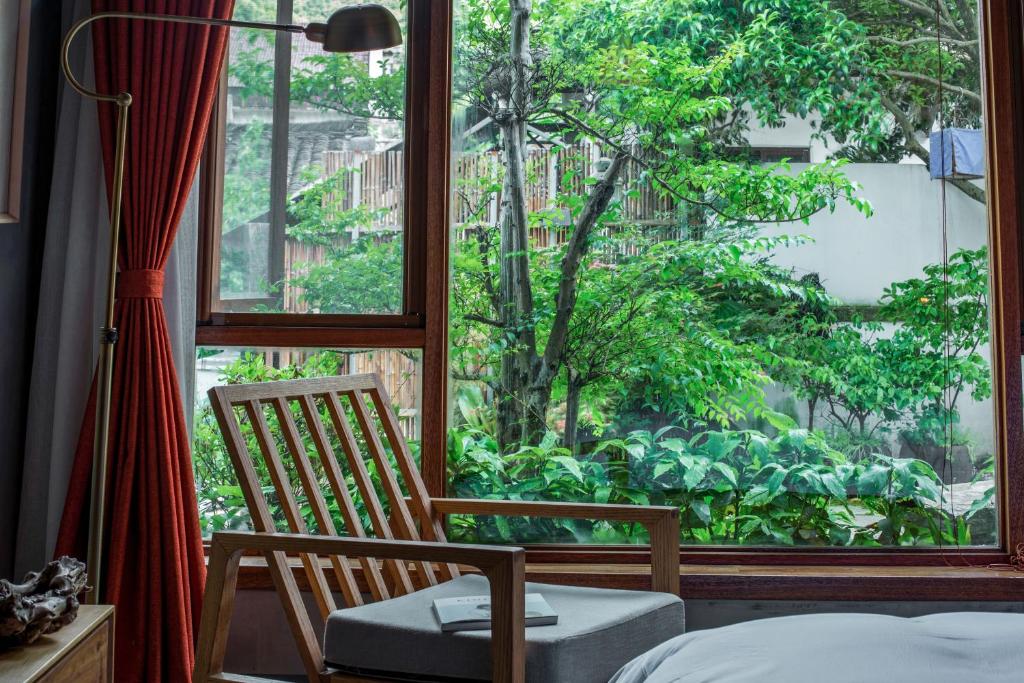 Двухместный (Двухместный номер с 1 кроватью, вид на сад) семейного отеля Hangzhou Yushu Hostel, Ханчжоу