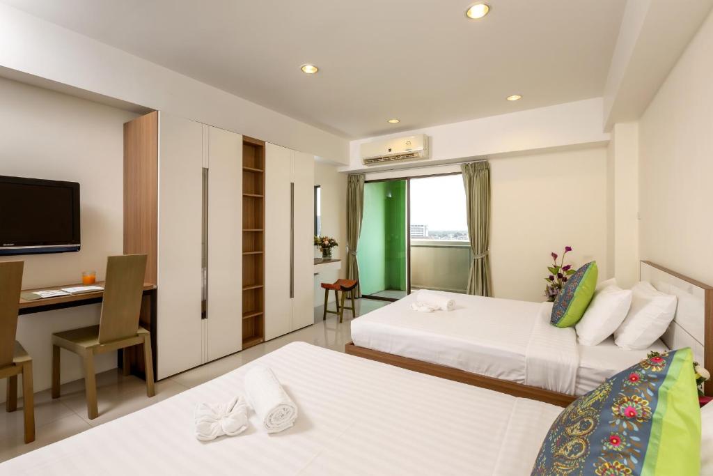 Двухместный (Улучшенный двухместный номер Делюкс с 1 кроватью или 2 отдельными кроватями), Отель Rompo Mansion Bangkok