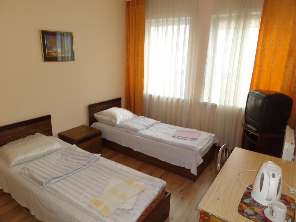 Двухместный (Бюджетный двухместный номер с 1 кроватью или 2 отдельными кроватями) отеля Hotel Rebir, Даугавпилс