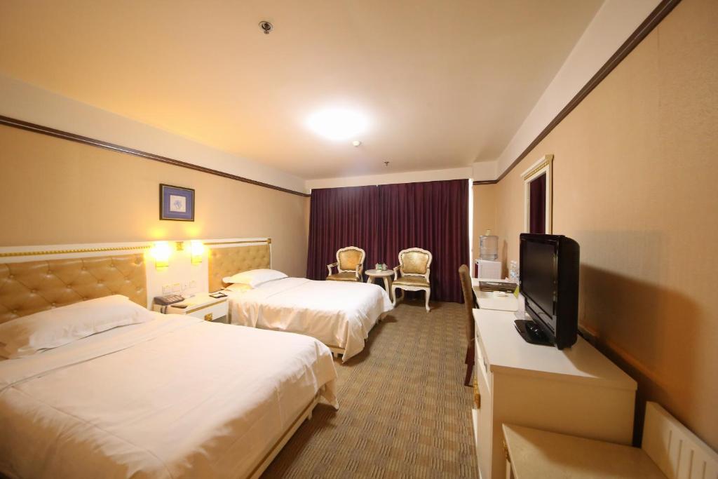 Двухместный (Mainland Chinese Citizen - Deluxe Twin Room A) отеля Yantai Asia Hotel, Яньтай