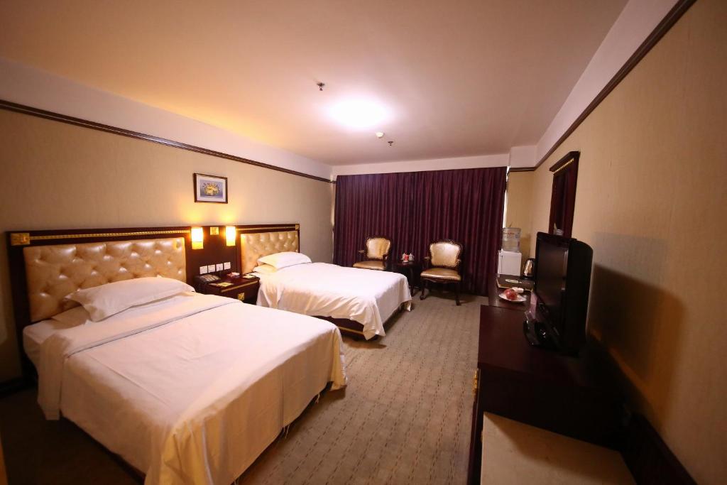 Двухместный (Mainland Chinese Citizen - Deluxe Twin Room B) отеля Yantai Asia Hotel, Яньтай