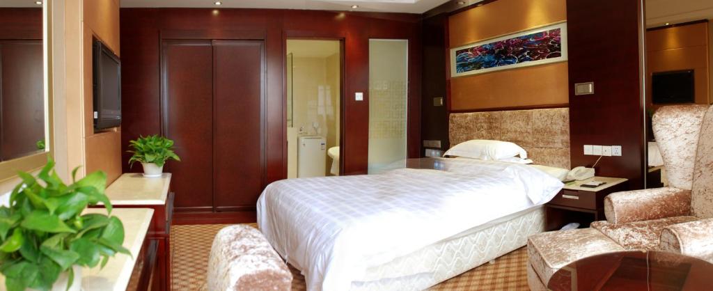 Двухместный (Для граждан континентального Китая — Двухместный номер Делюкс с 1 кроватью) отеля Yantai Asia Hotel, Яньтай