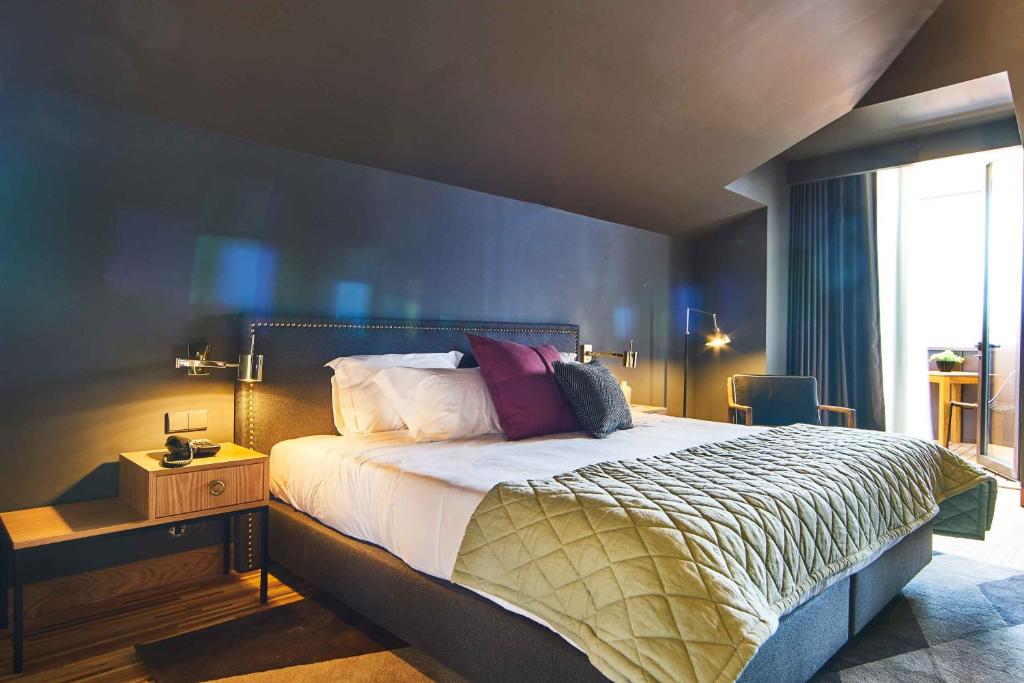 Двухместный (Представительский двухместный номер Делюкс с 1 кроватью или 2 отдельными кроватями) отеля Torel Avantgarde, Порту