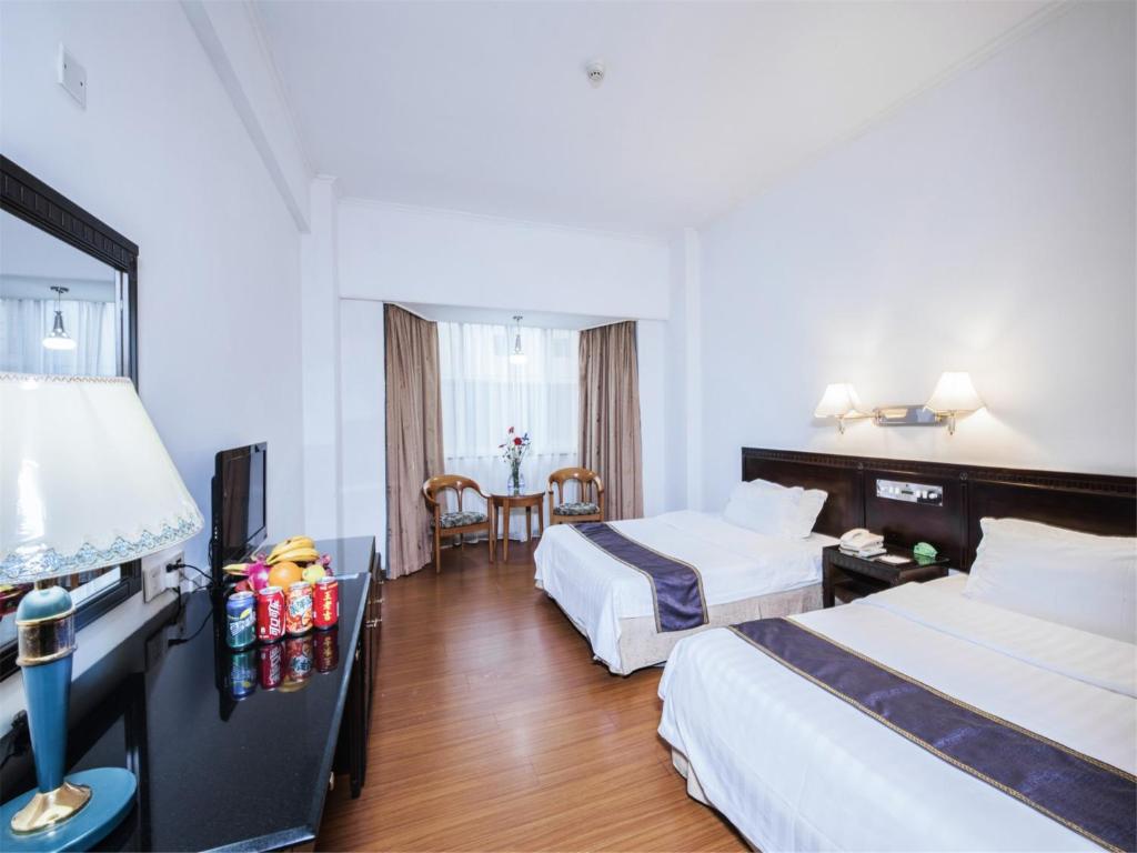 Двухместный (Стандартный двухместный номер с 1 кроватью или 2 отдельными кроватями) отеля Guangzhou Zhuhai Special Economic Zone Hotel, Гуанчжоу