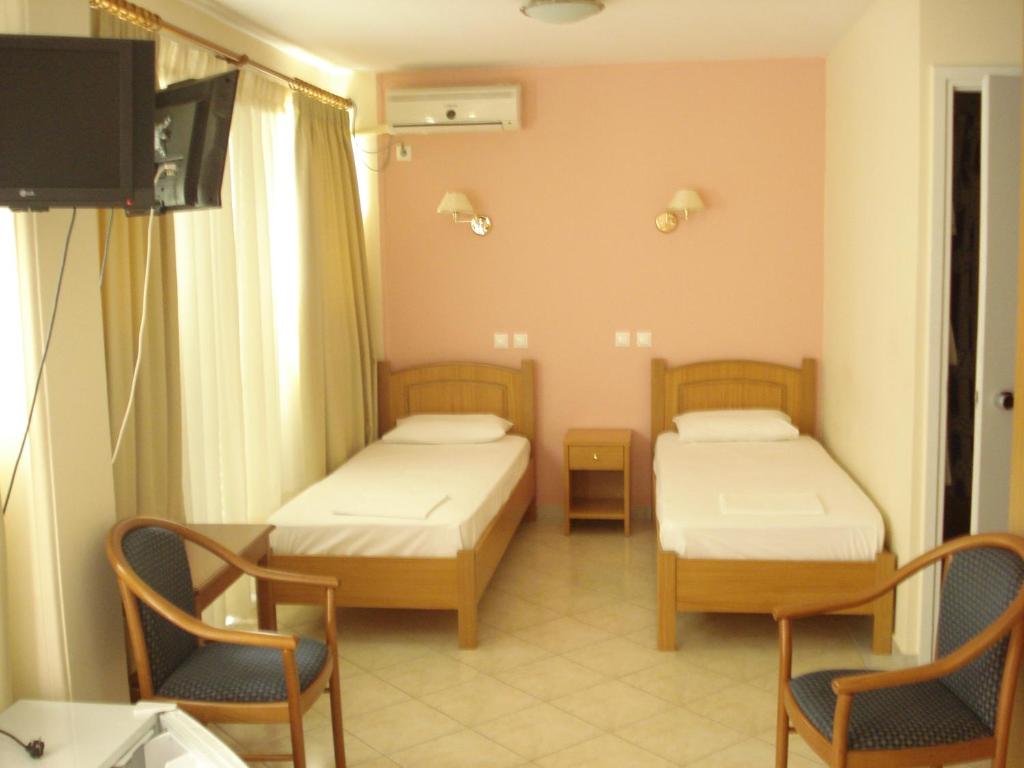 Двухместный (Двухместный номер с 1 кроватью или 2 отдельными кроватями) отеля Cybele Guest Accommodation, Афины
