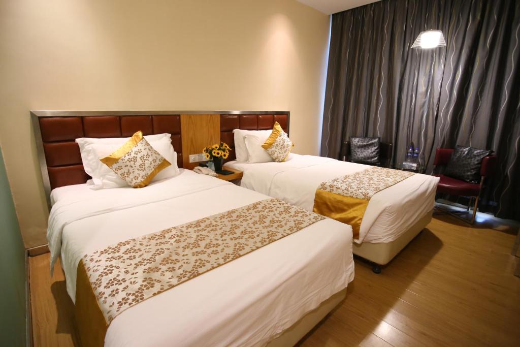 Двухместный (Стандартный двухместный номер с 2 отдельными кроватями (без окна)) отеля Shanshui Trends Hotel East Station, Гуанчжоу