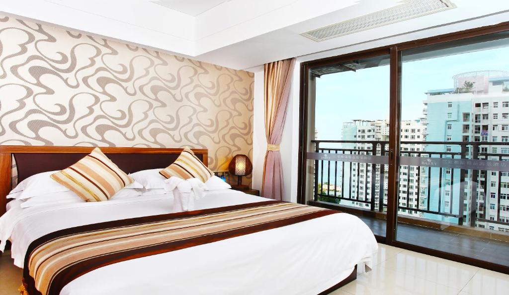 Двухместный (Улучшенный двухместный номер с 1 кроватью или 2 отдельными кроватями и видом на море) отеля Barry Boutique Hotel Sanya, Санья