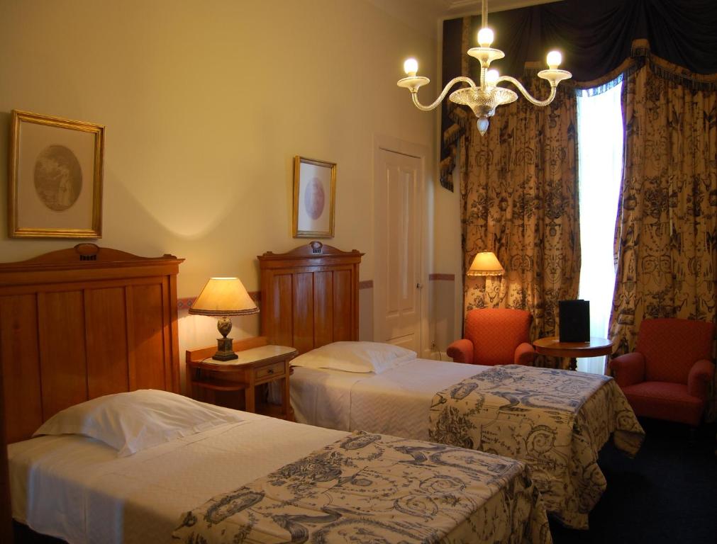 Двухместный (Улучшенный двухместный номер с 1 кроватью или 2 отдельными кроватями) отеля Palace Hotel do Bussaco, Лузу