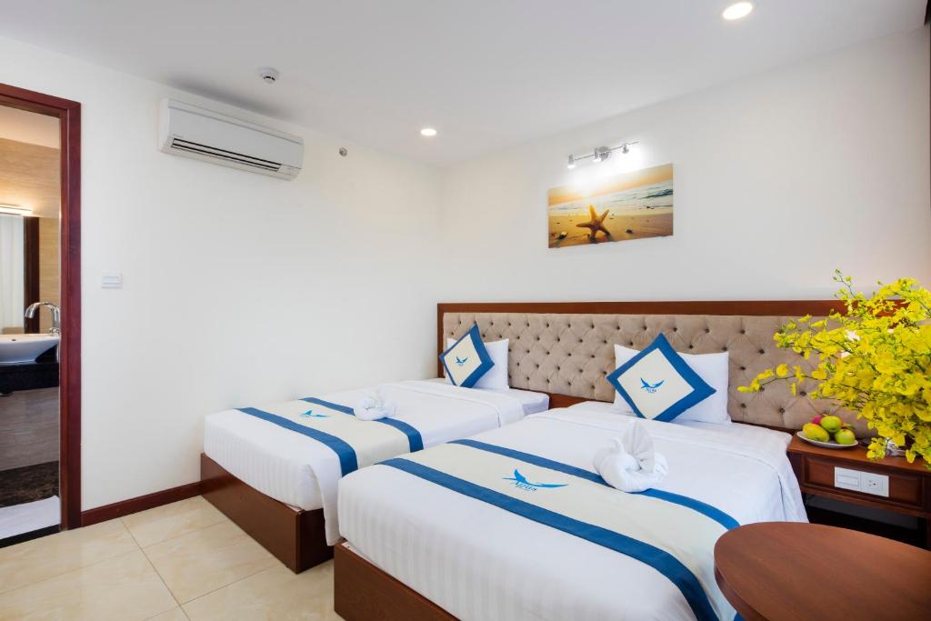 Двухместный (Двухместный номер Делюкс с 1 кроватью или 2 отдельными кроватями, вид на город) отеля Apus Hotel, Нячанг