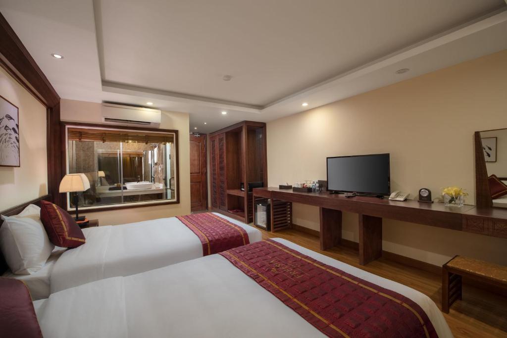 Двухместный (Улучшенный двухместный номер с 2 отдельными кроватями) отеля Sapa Freesia Hotel, Сапа