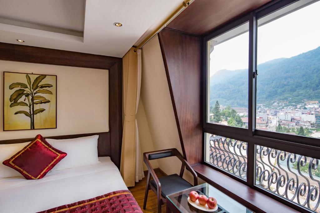 Двухместный (Двухместный номер с 2 отдельными кроватями и видом на горы) отеля Sapa Freesia Hotel, Сапа