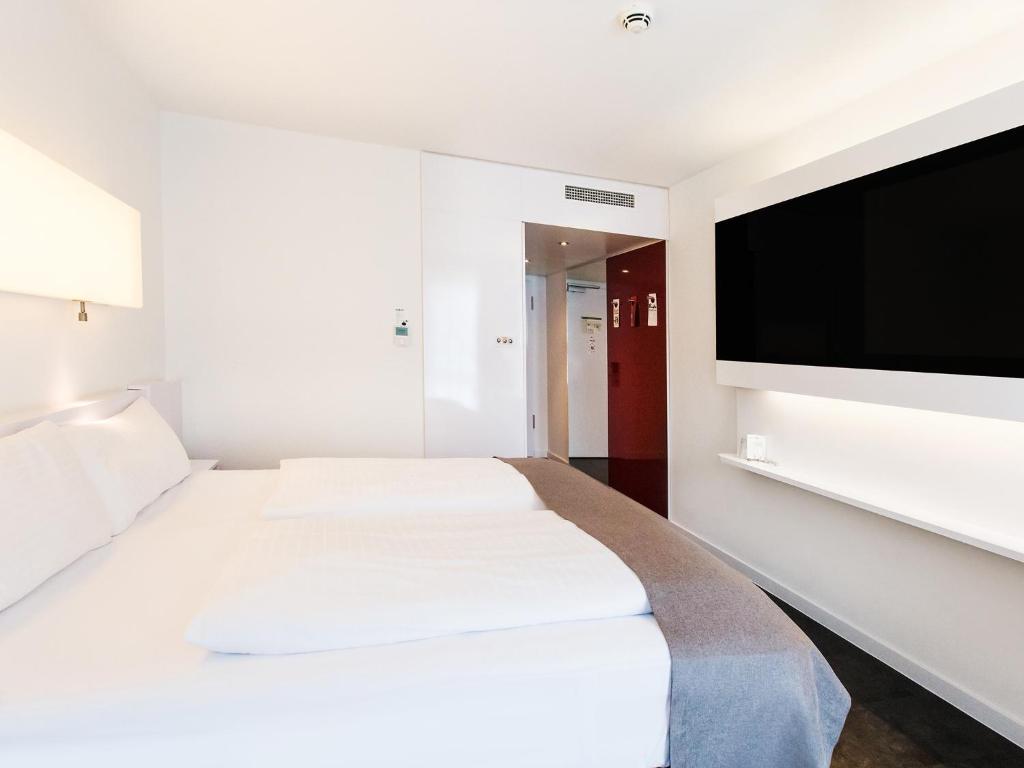 Двухместный (Стандартный двухместный номер с 1 кроватью) отеля DORMERO Hotel Frankfurt, Франкфурт-на-Майне