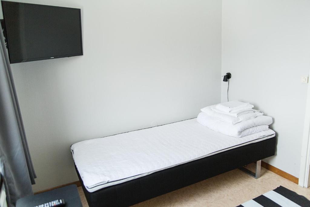 Трехместный (Трехместный номер эконом-класса с общей ванной комнатой) отеля SPiS Hotel & Hostel, Кируна
