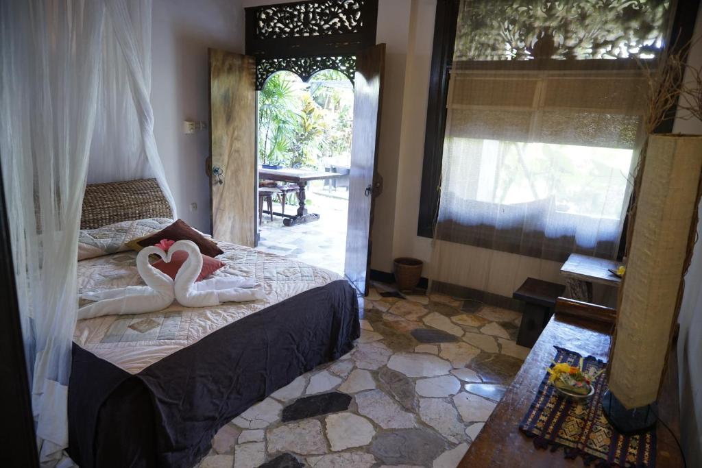 Двухместный (Двухместный номер с 1 кроватью, вид на сад) гостевого дома Puri Cantik, Убуд